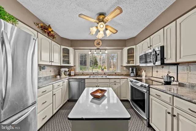 a bathroom with a bathtub and a sink