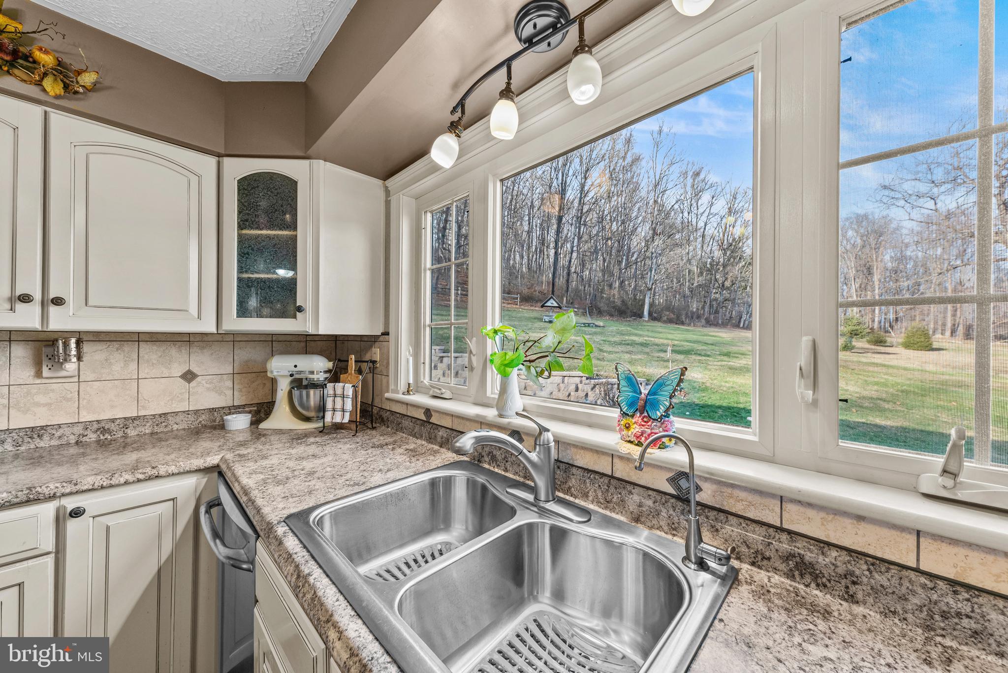125 Housel Road Hopewell, PA 16650 - Photo 41 of 105 a kitchen with a sink and a large window