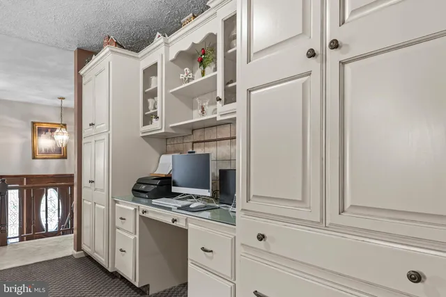 a view of a chairs and table in the patio