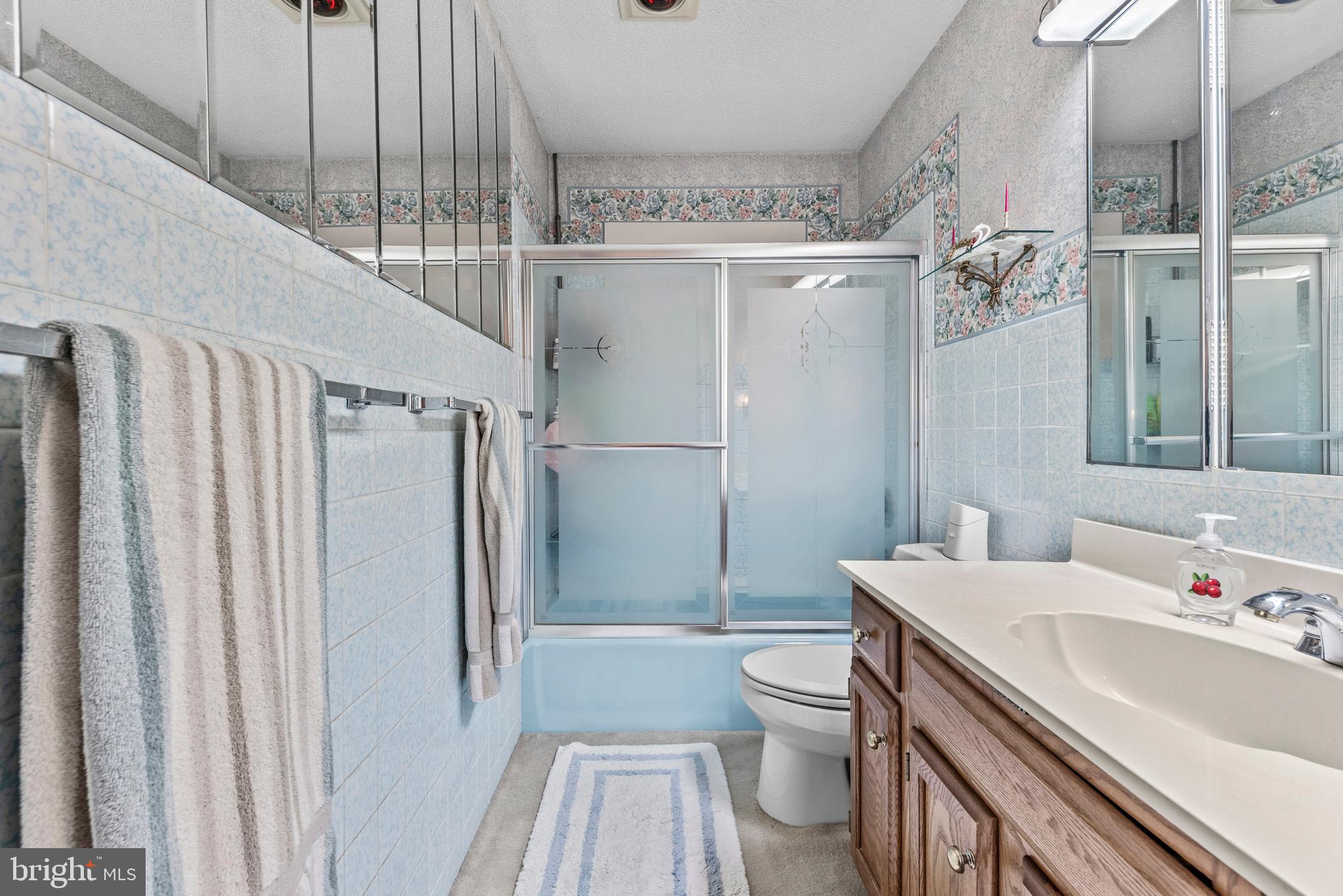 125 Housel Road Hopewell, PA 16650 - Photo 50 of 105 a bathroom with a sink a toilet and shower