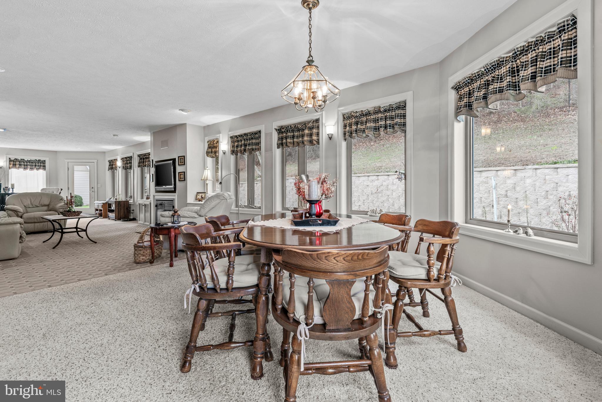 125 Housel Road Hopewell, PA 16650 - Photo 55 of 105 a view of a dining room with furniture window and outside view