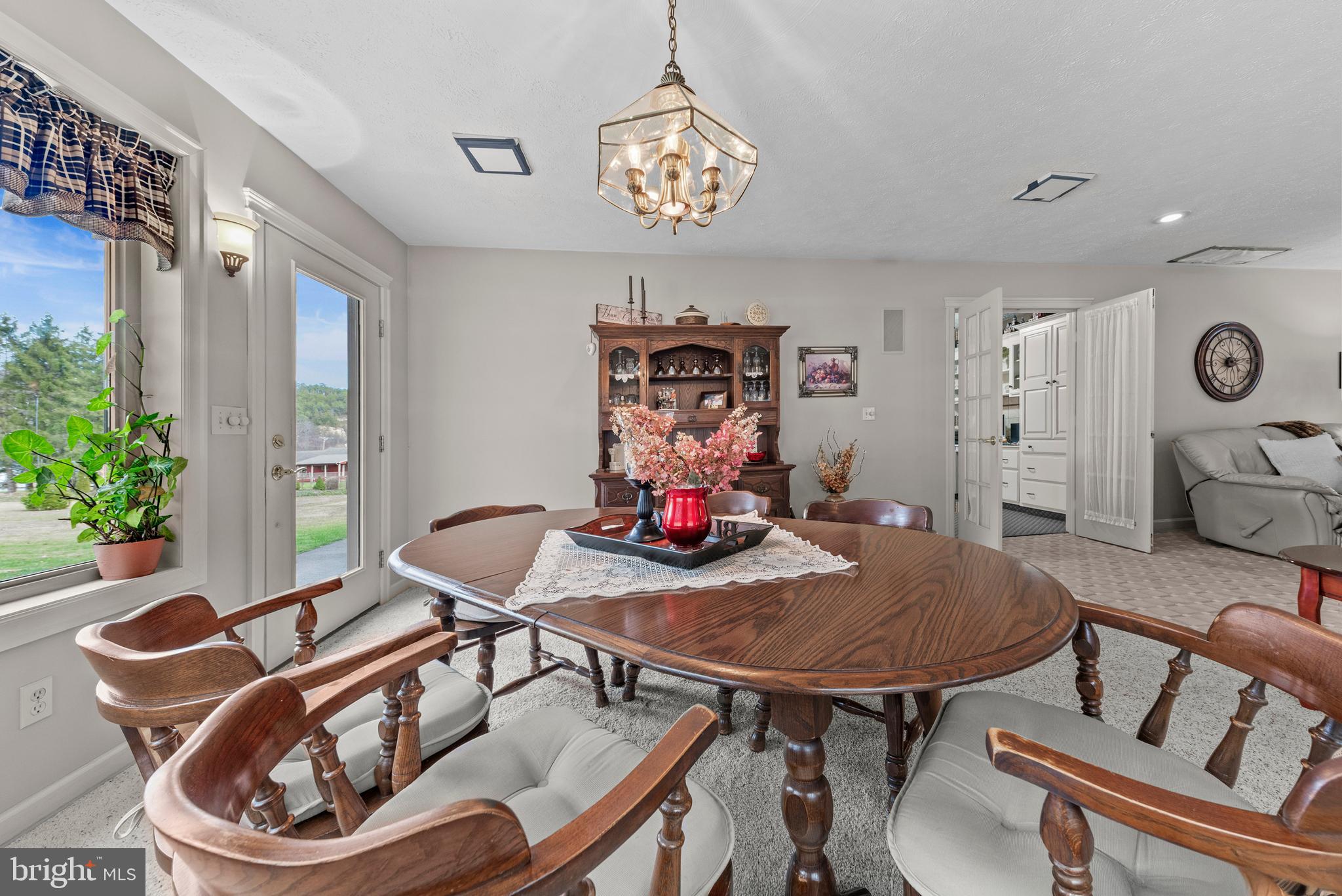 125 Housel Road Hopewell, PA 16650 - Photo 56 of 105 a view of a dining room with furniture window and outside view