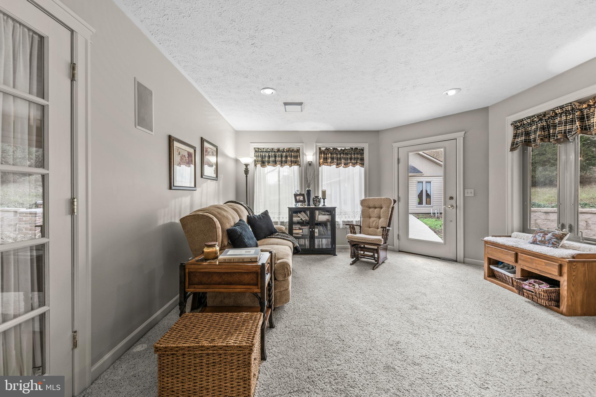 125 Housel Road Hopewell, PA 16650 - Photo 63 of 105 a living room with furniture and a flat screen tv