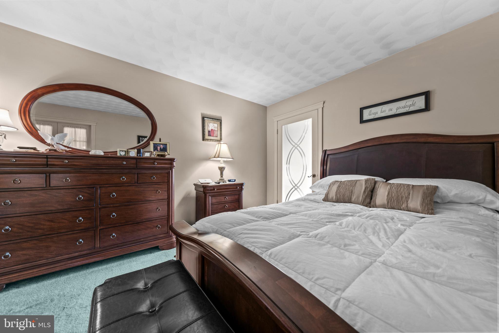 125 Housel Road Hopewell, PA 16650 - Photo 68 of 105 a bedroom with a bed and a dresser