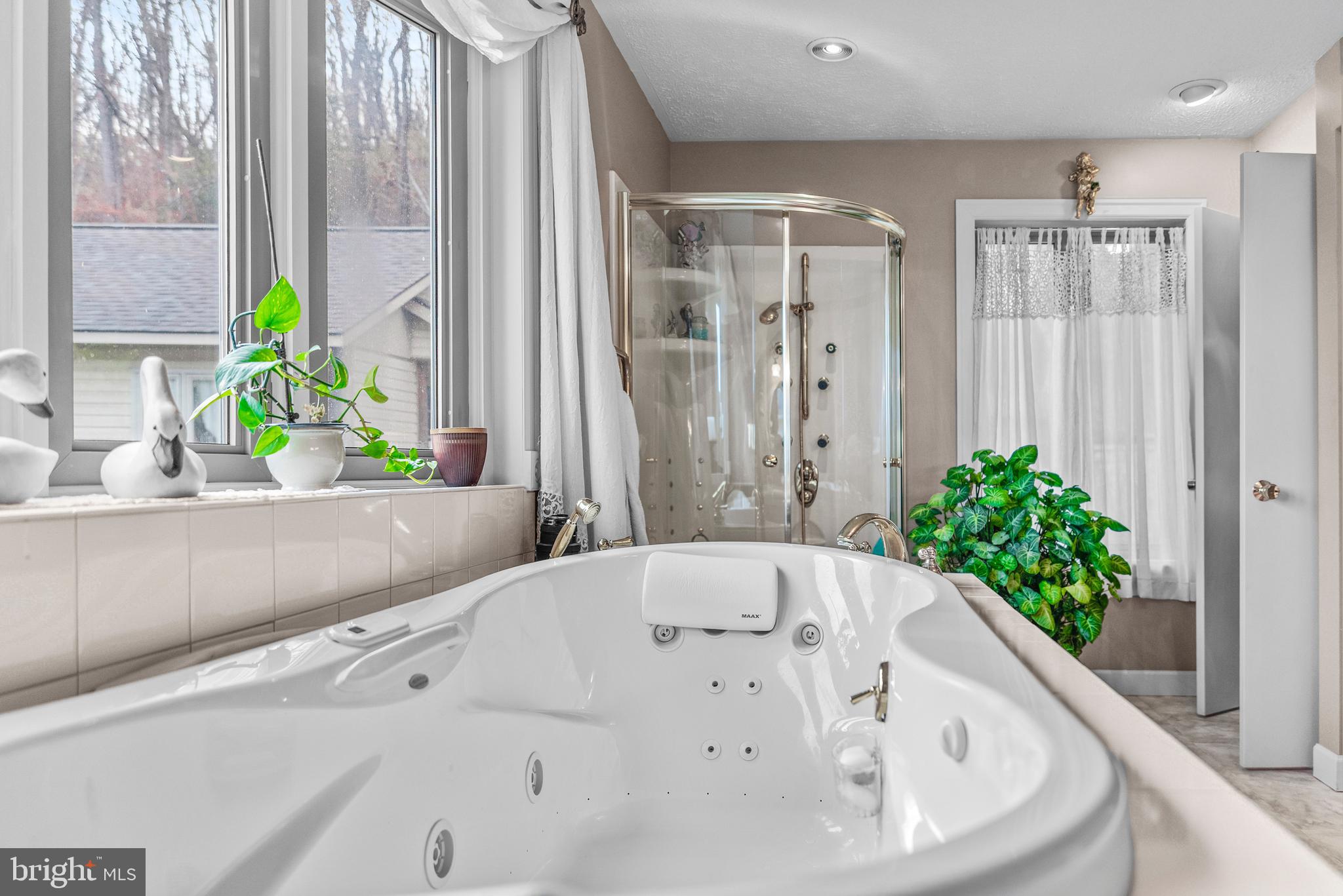 125 Housel Road Hopewell, PA 16650 - Photo 75 of 105 a bathroom with a bathtub and a sink