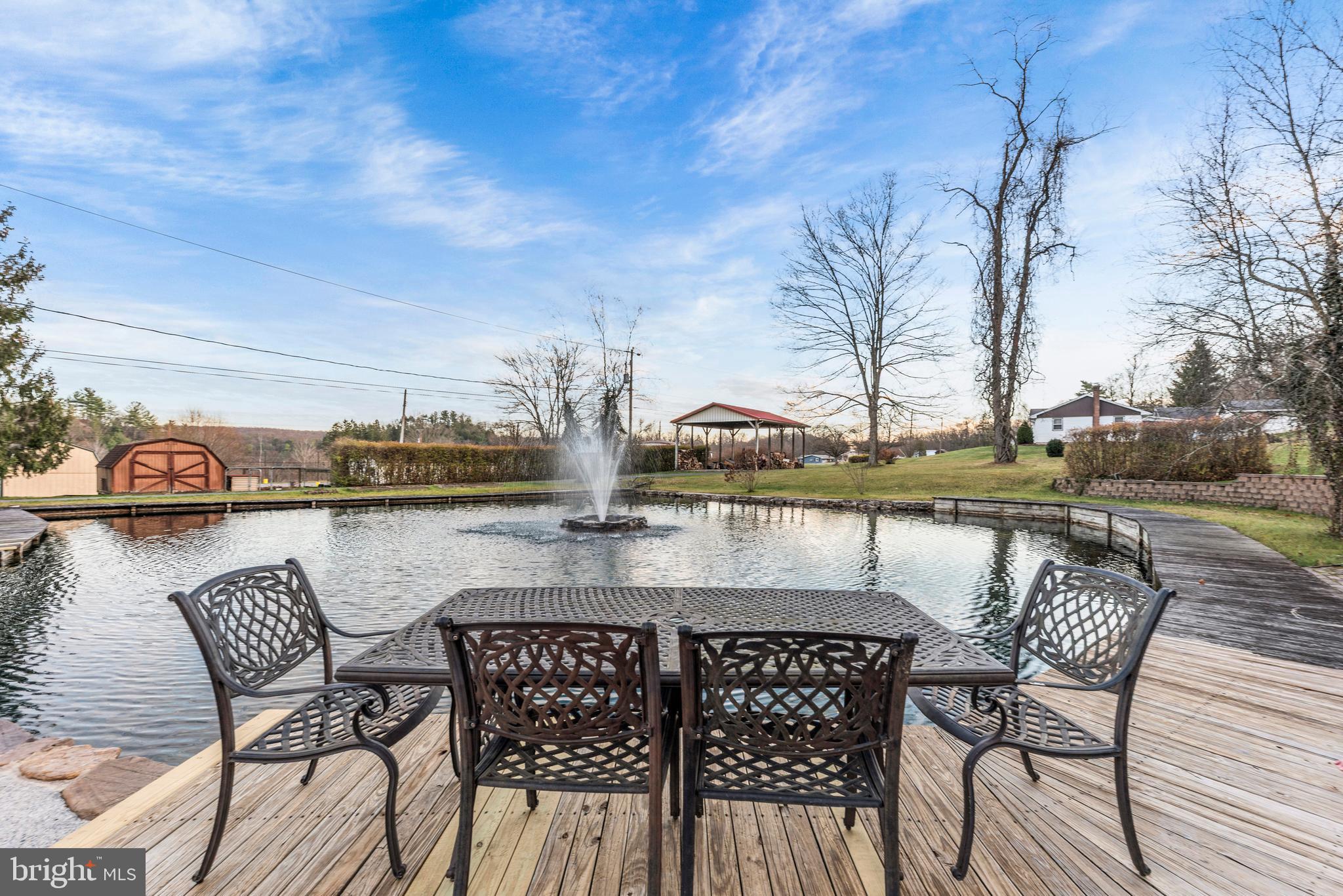 125 Housel Road Hopewell, PA 16650 - Photo 85 of 105 a view of a chair and table on the terrace