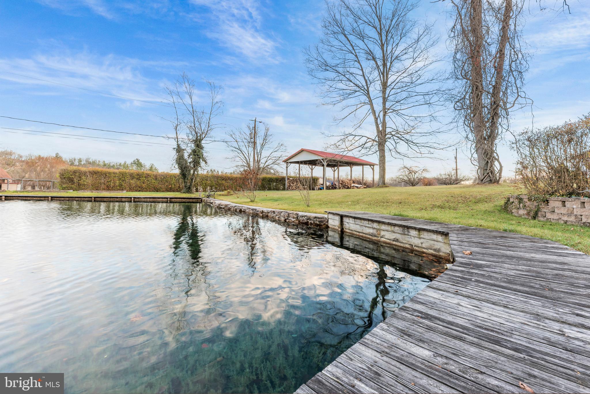 125 Housel Road Hopewell, PA 16650 - Photo 86 of 105 a view of a lake with houses in the back