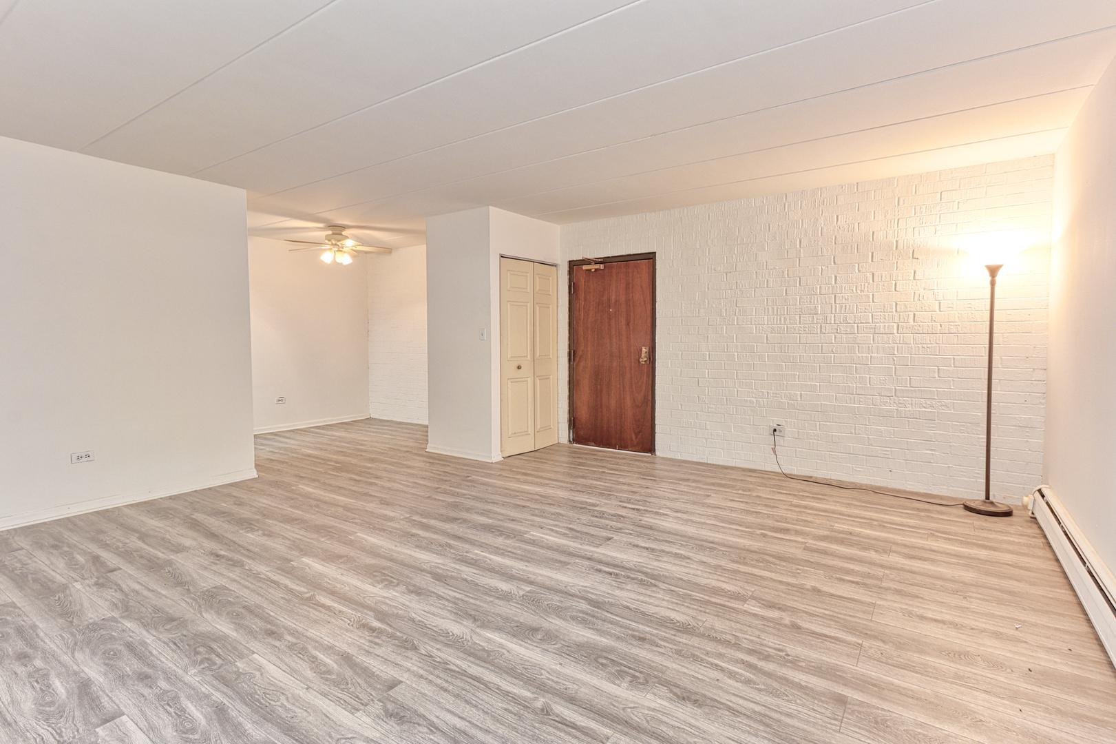 138 East Bailey Road, Unit B Naperville, IL 60565 - Photo 2 of 12 a view of empty room with wooden floor
