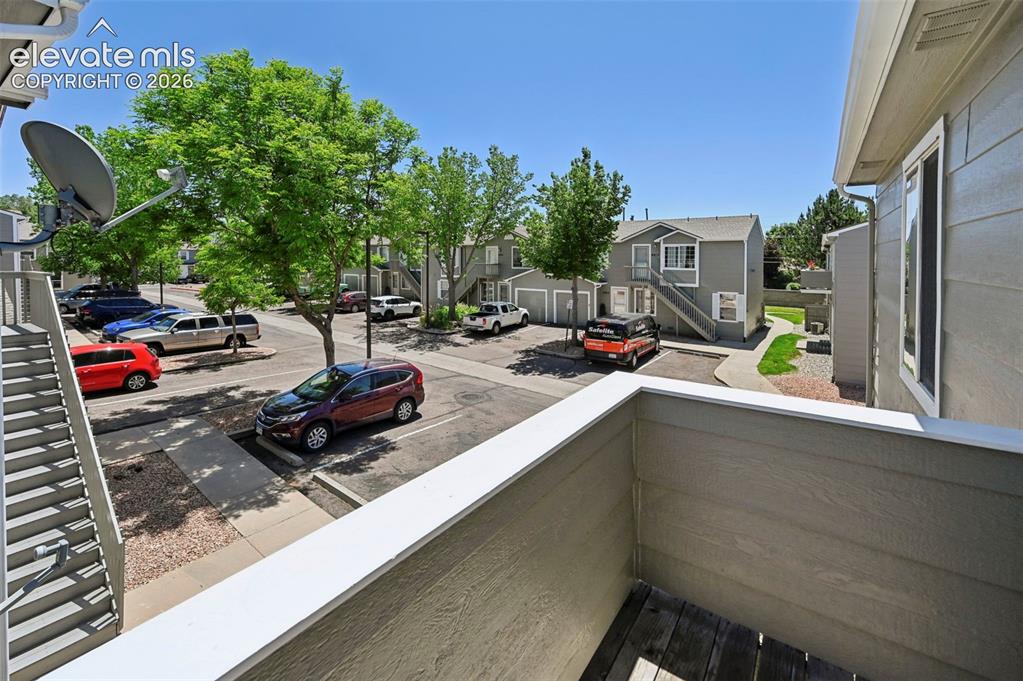 431 Kitfield View Colorado Springs, CO 80916 - Photo 24 of 27 a view of a street with sitting area