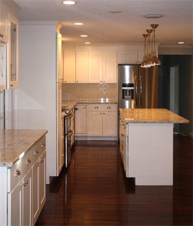 160 Parish Road Needham, MA 02494 - Photo 4 of 14 a kitchen with a refrigerator and a stove top oven
