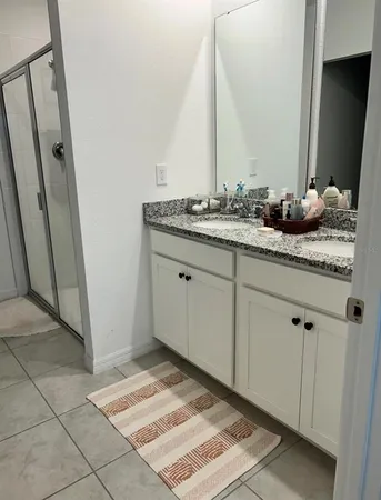a picture of a bench in front of a door