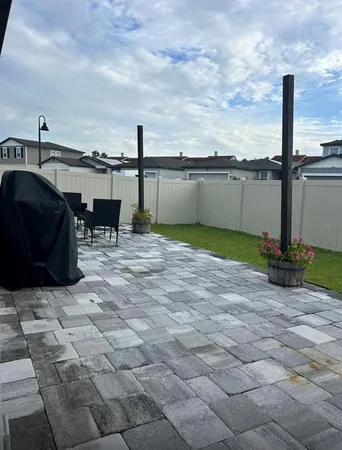 a view of a terrace with furniture
