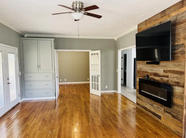 a view of an empty room and window