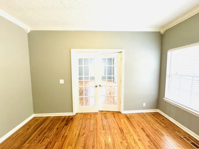 a view of deck with wooden floor and outdoor seating
