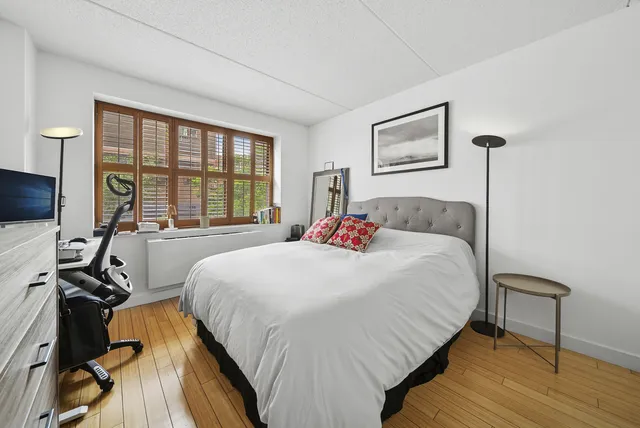 a picture of a book and a bed