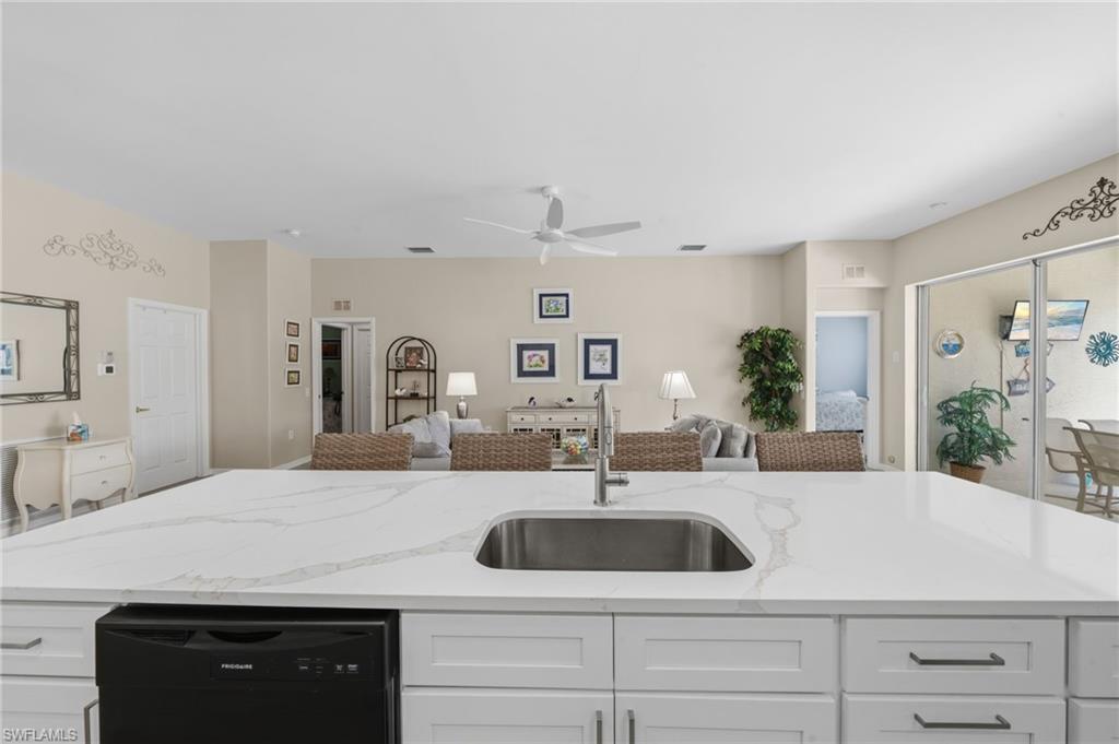 10020 Horse Creek Road Fort Myers, FL 33913 - Photo 12 of 31 a bathroom with a sink and a mirror