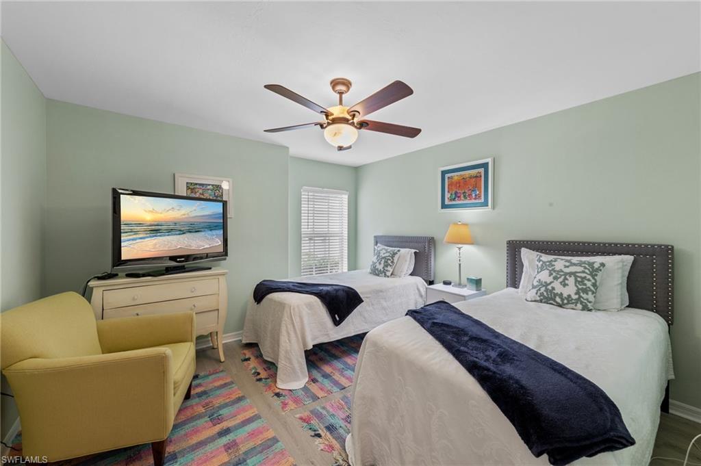 10020 Horse Creek Road Fort Myers, FL 33913 - Photo 22 of 31 a bedroom with two beds and a flat screen tv