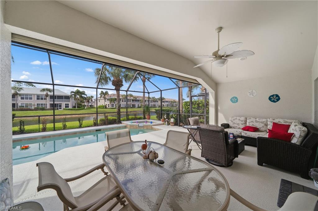 10020 Horse Creek Road Fort Myers, FL 33913 - Photo 30 of 31 a living room with patio furniture and a floor to ceiling window