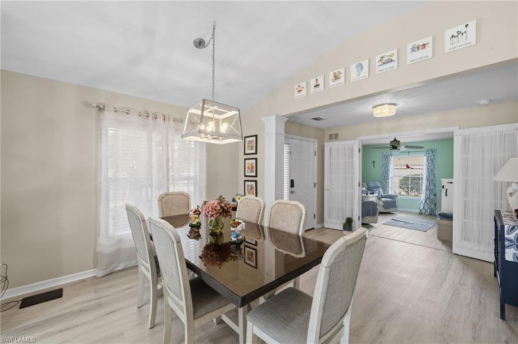 10020 Horse Creek Road Fort Myers, FL 33913 - Photo 7 of 31 a view of a dining room with furniture window and wooden floor