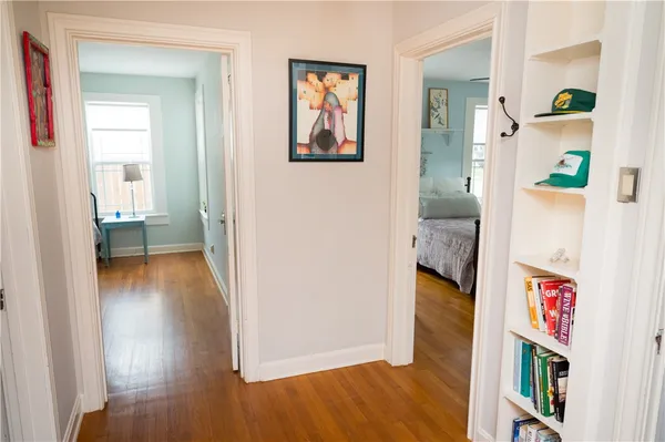a bathroom with a sink toilet and a mirror