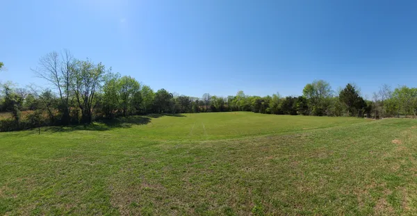 a view of an outdoor space and a yard