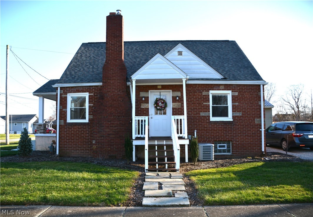 67 Medina Street Rittman, OH 44270 - Photo 2 of 26 Bungalow-style home featuring the front lawn
