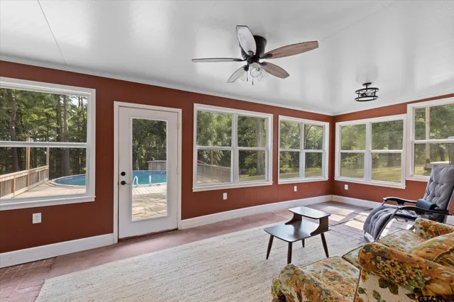 a living room with furniture and a window
