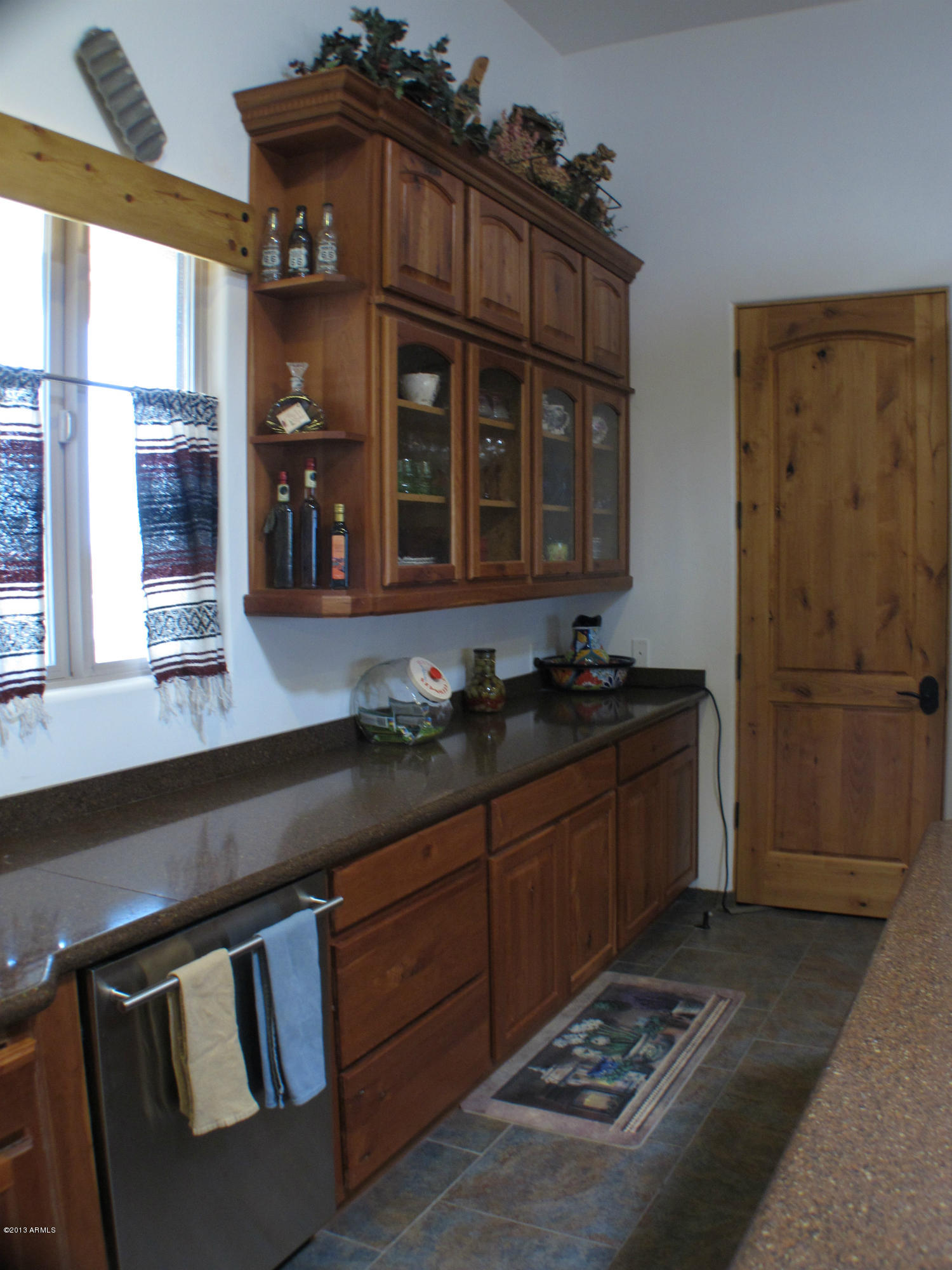 2746 North Warren Road Maricopa, AZ 85139 - Photo 16 of 45 Kitchen - Glass cabinets-shelves
