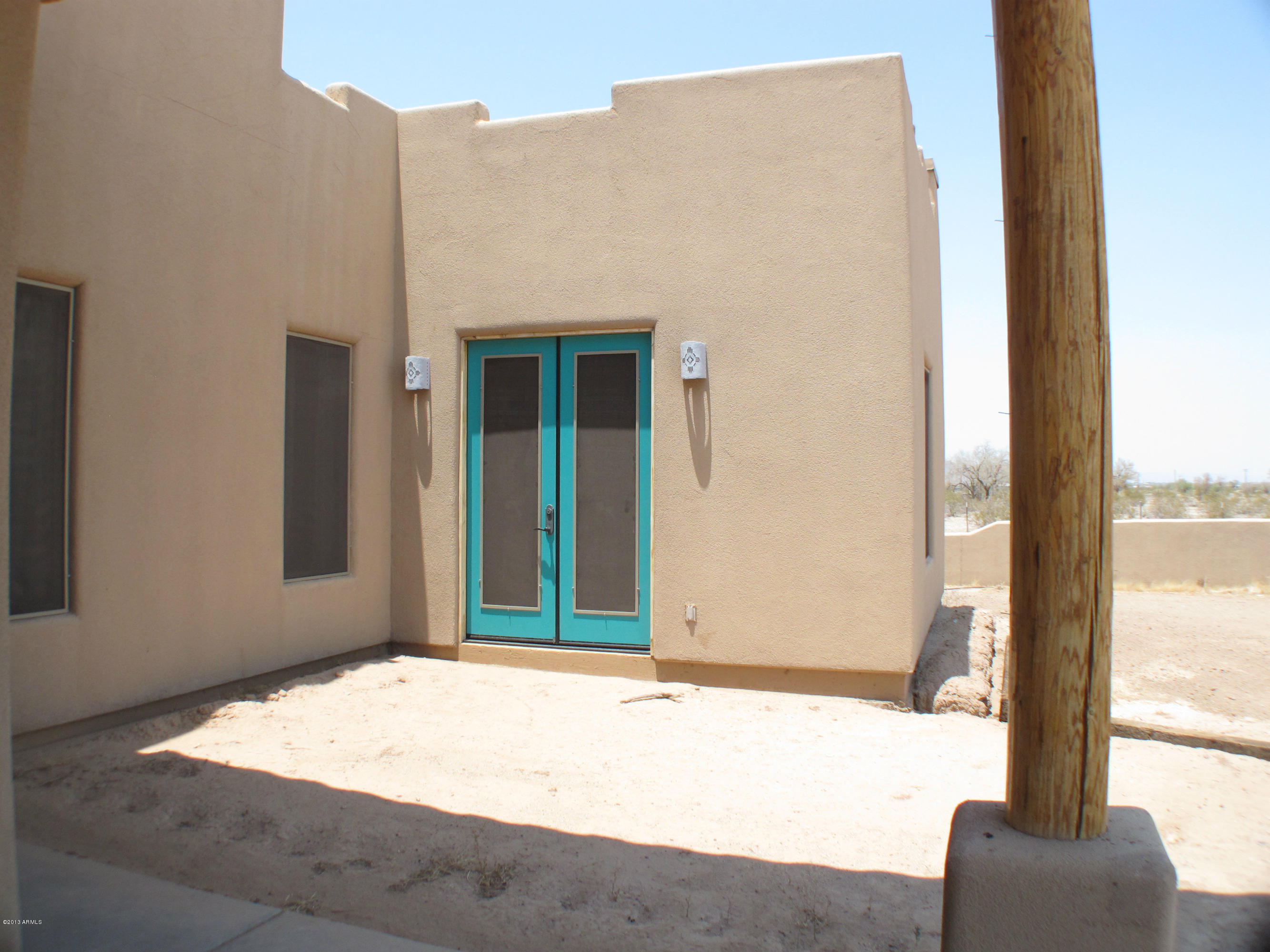 2746 North Warren Road Maricopa, AZ 85139 - Photo 22 of 45 Double Doors from Master Bed
