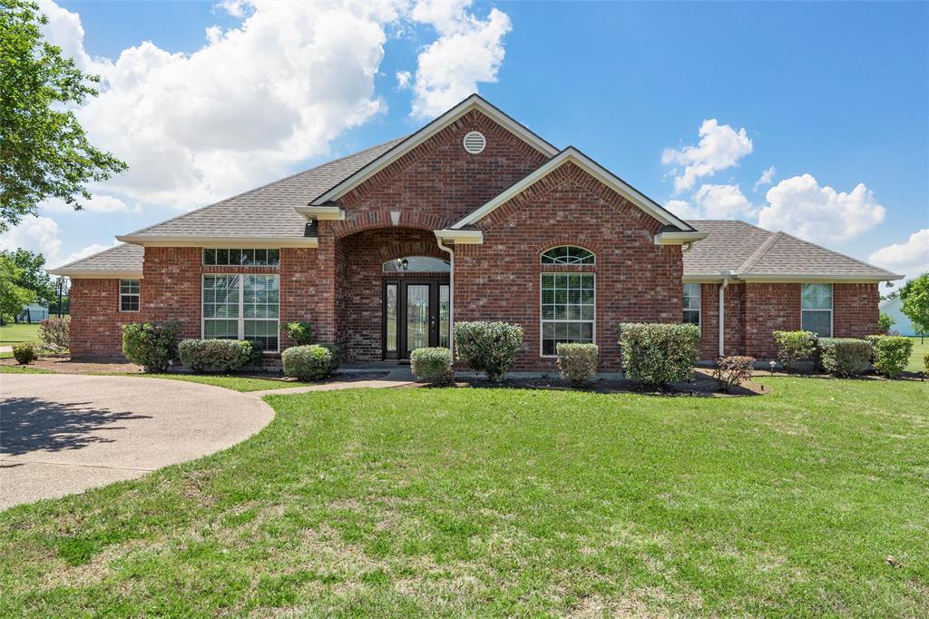 Ranch-style house featuring brick siding on 1.6 acres