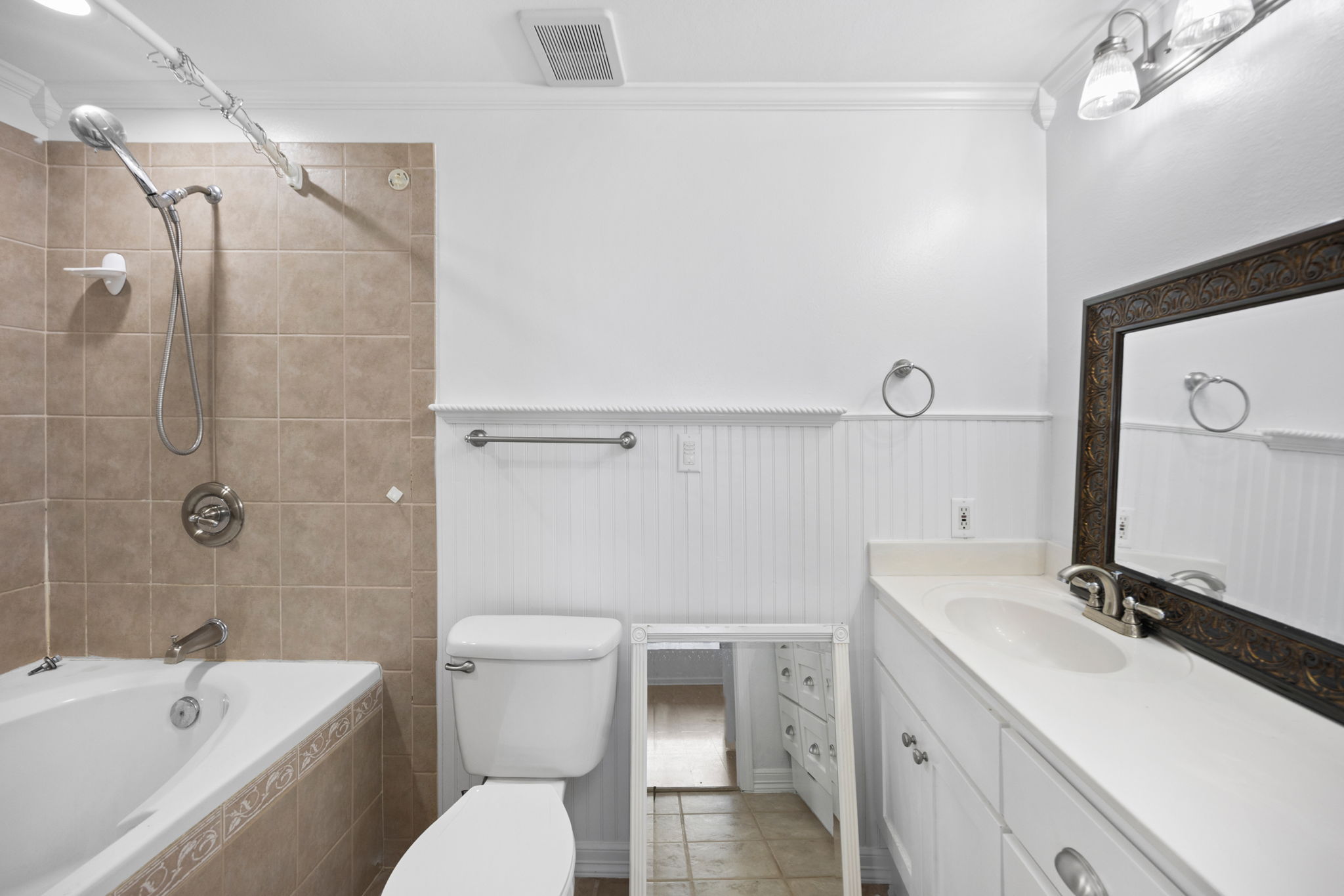 610 Eastview Drive Georgetown, TX 78626 - Photo 14 of 39 a bathroom with a sink a toilet and shower