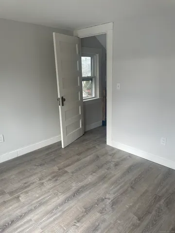 wooden floor and window in a room