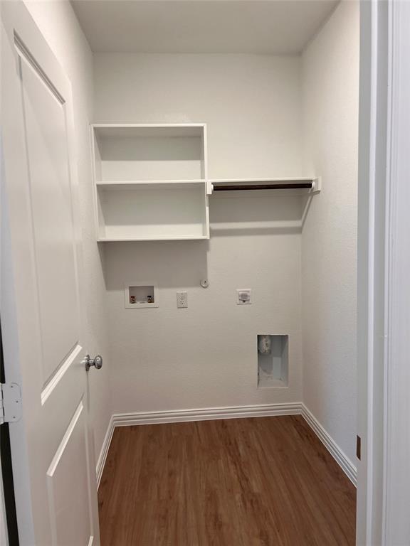 252 Ardsley Lane Princeton, TX 75407 - Photo 13 of 33 a view of a room with wooden floor
