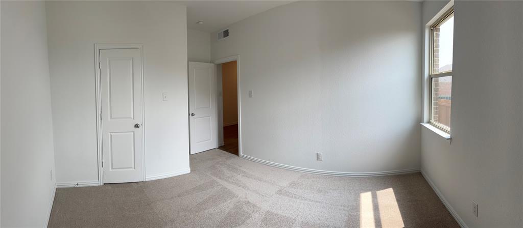 252 Ardsley Lane Princeton, TX 75407 - Photo 15 of 33 a view of an empty room with a window