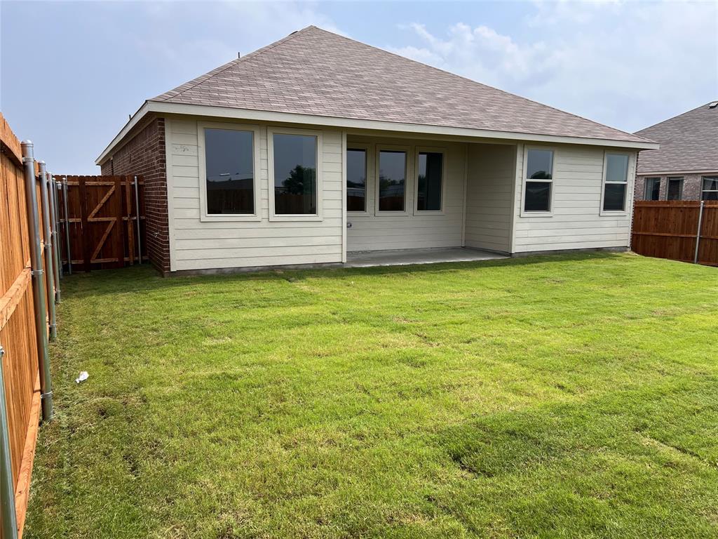 252 Ardsley Lane Princeton, TX 75407 - Photo 17 of 33 a view of a house with yard