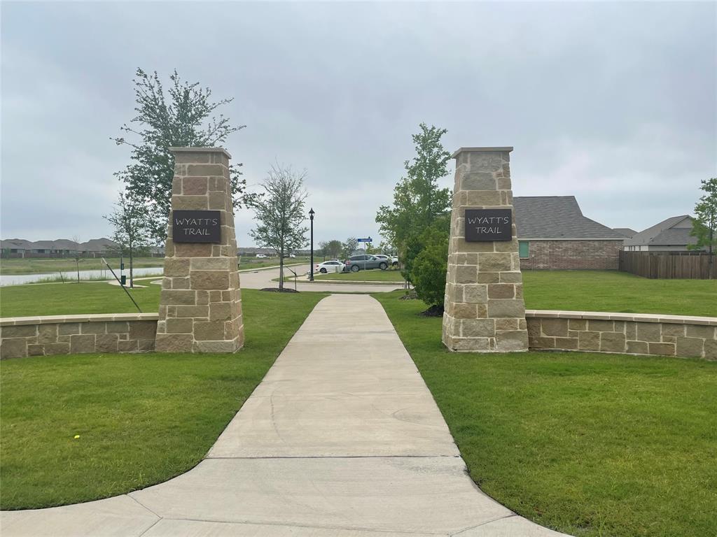 252 Ardsley Lane Princeton, TX 75407 - Photo 19 of 33 a view of a park with multi story residential apartment building in the background