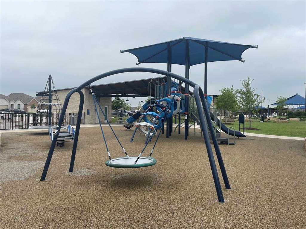 252 Ardsley Lane Princeton, TX 75407 - Photo 23 of 33 a view of a slide with table in kitchen