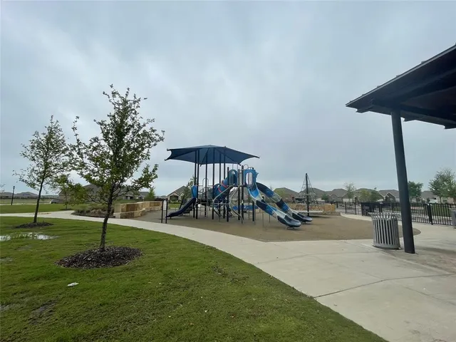 a view of a lake in middle of forest
