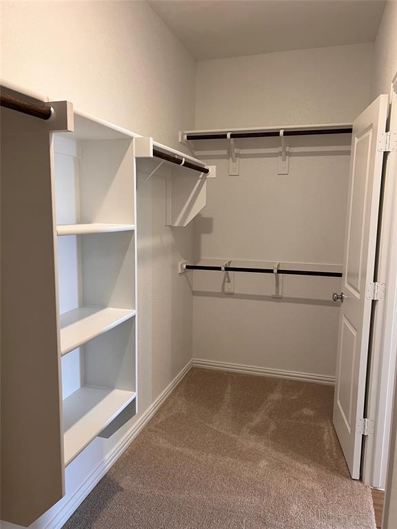 252 Ardsley Lane Princeton, TX 75407 - Photo 10 of 33 a view of an empty walk in closet