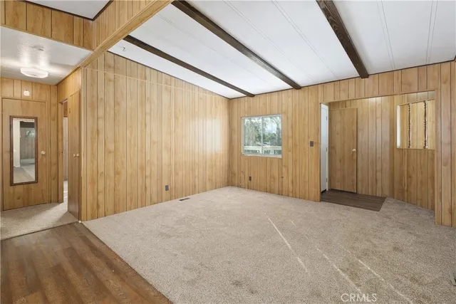 a view of a kitchen with a sink and dishwasher a refrigerator