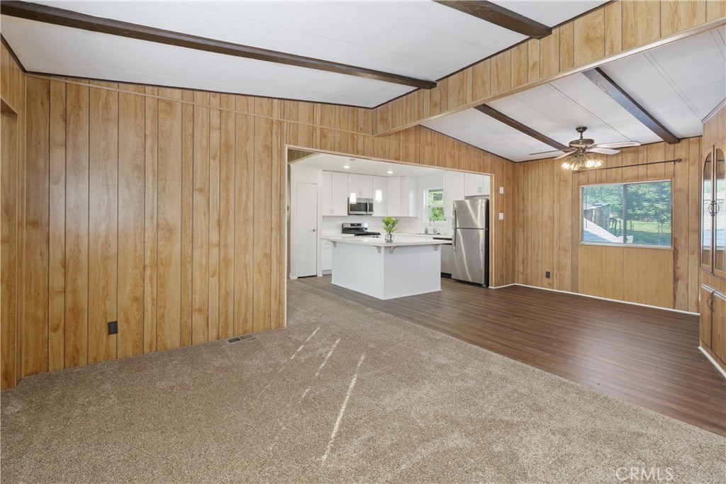 33462 Loquat Street Wildomar, CA 92595 - Photo 17 of 41 a view of a kitchen with a sink and dishwasher a refrigerator