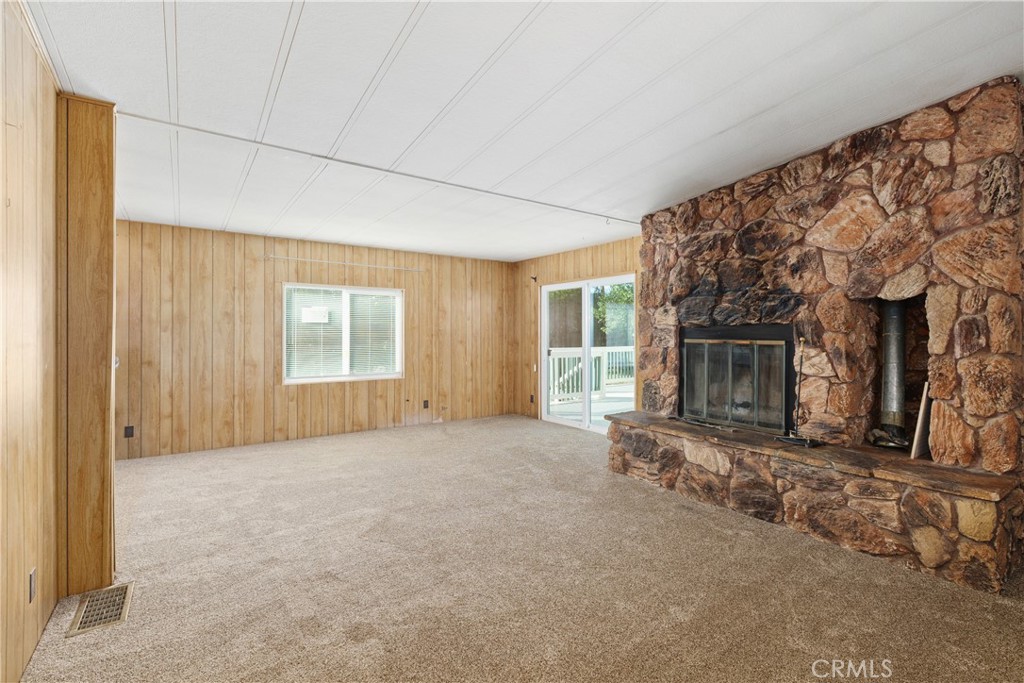 33462 Loquat Street Wildomar, CA 92595 - Photo 18 of 41 an empty room with windows