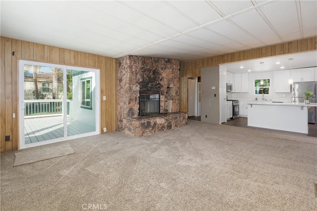 33462 Loquat Street Wildomar, CA 92595 - Photo 23 of 41 a view of a big room with windows and cabinet