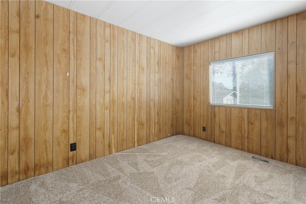33462 Loquat Street Wildomar, CA 92595 - Photo 32 of 41 a view of an empty room with a window