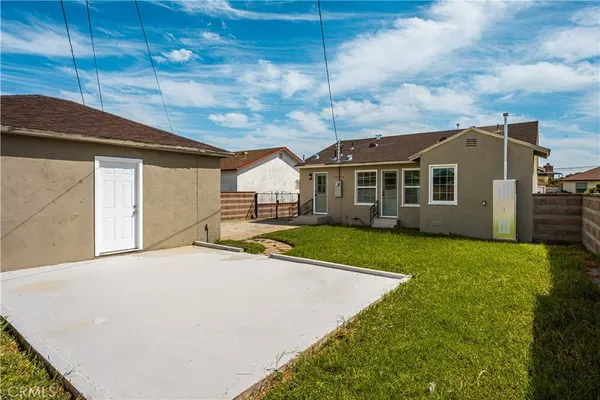 a view of house with outdoor space