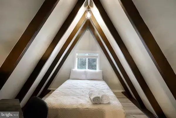 a living room with chairs