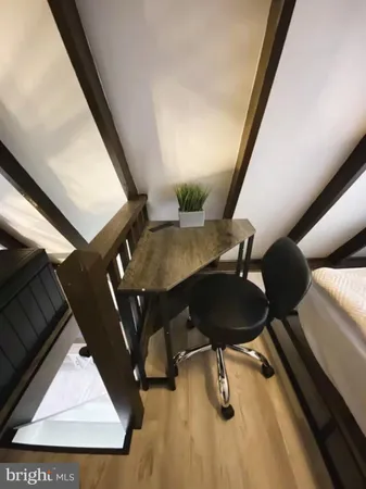 a view of entryway with a front door