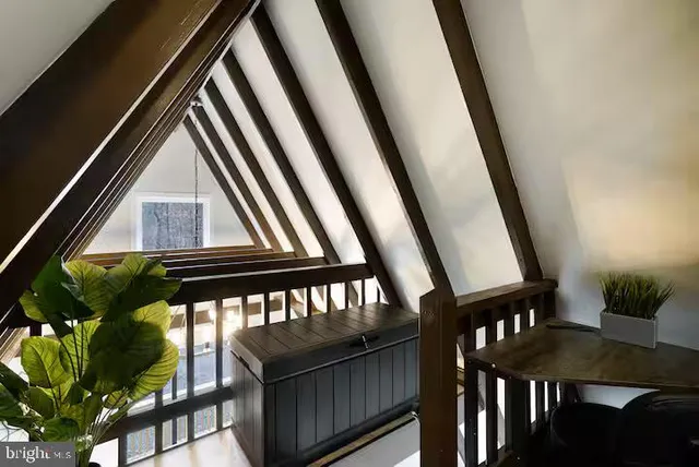 a view of a swimming pool with a yard