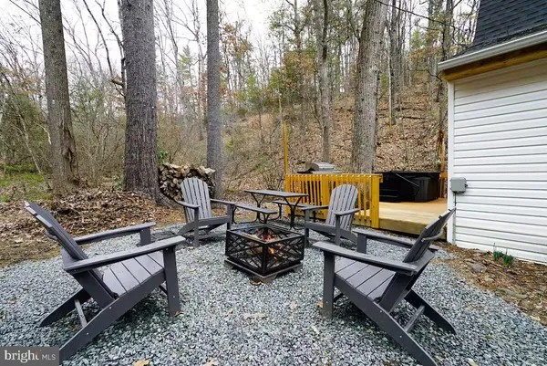 a view of a balcony with chairs