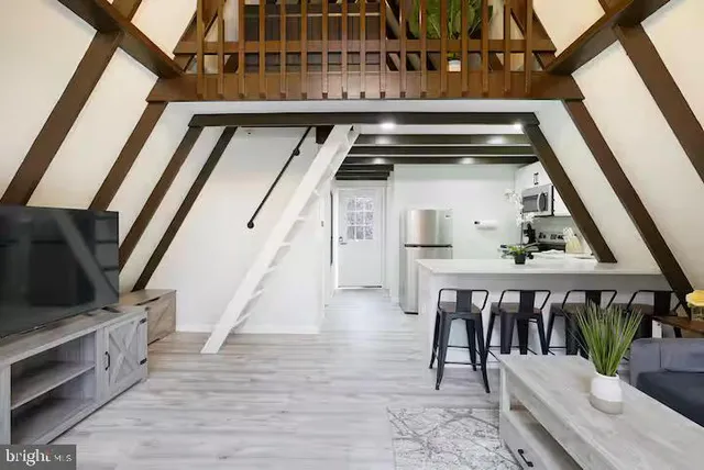 a view of an chairs and table in the balcony